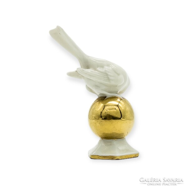 Fasold & stauch bird on gold sphere