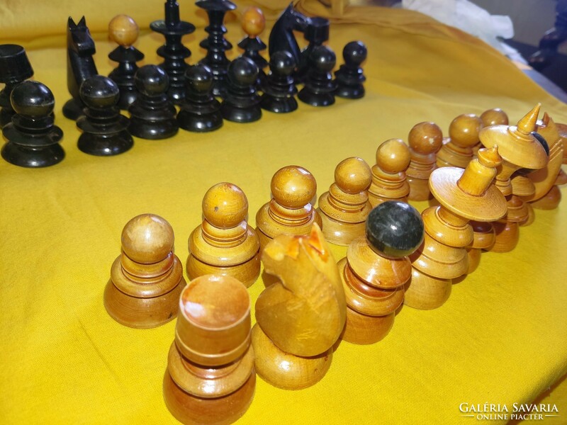 Old wooden chess pieces.