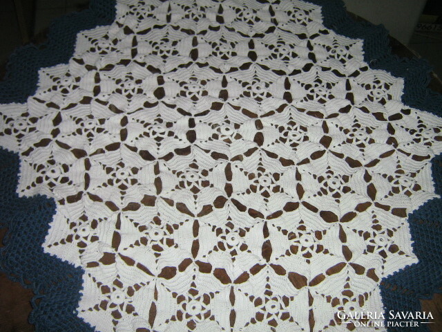 Beautiful handmade crochet tablecloth of special shape