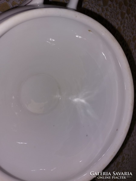 Antique porcelain soup bowl with base