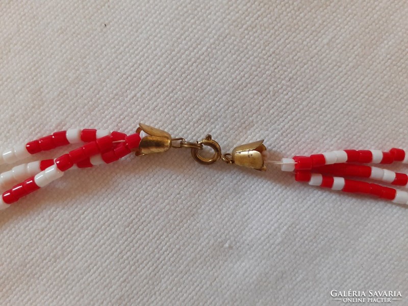 Long, three-line red and white glass necklace