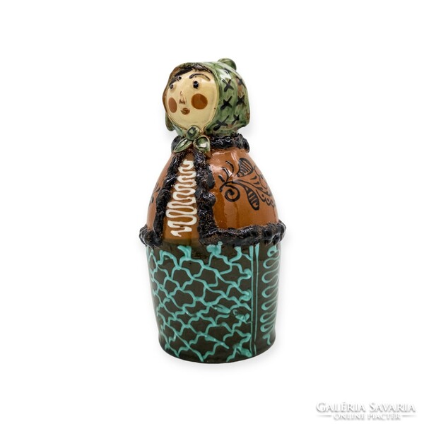 Shaped earthenware butella female cantor with headscarf and kun farmer skeleton