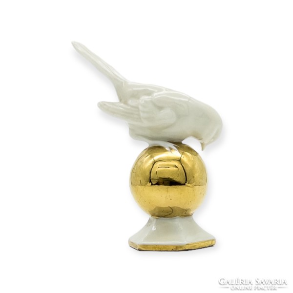 Fasold & stauch bird on gold sphere