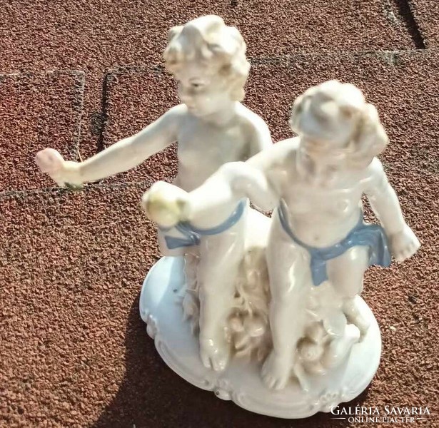 Pair of old German crown stamped baroque porcelain children