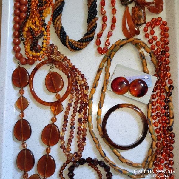 13.Cs. Used amber jewelry package in good condition