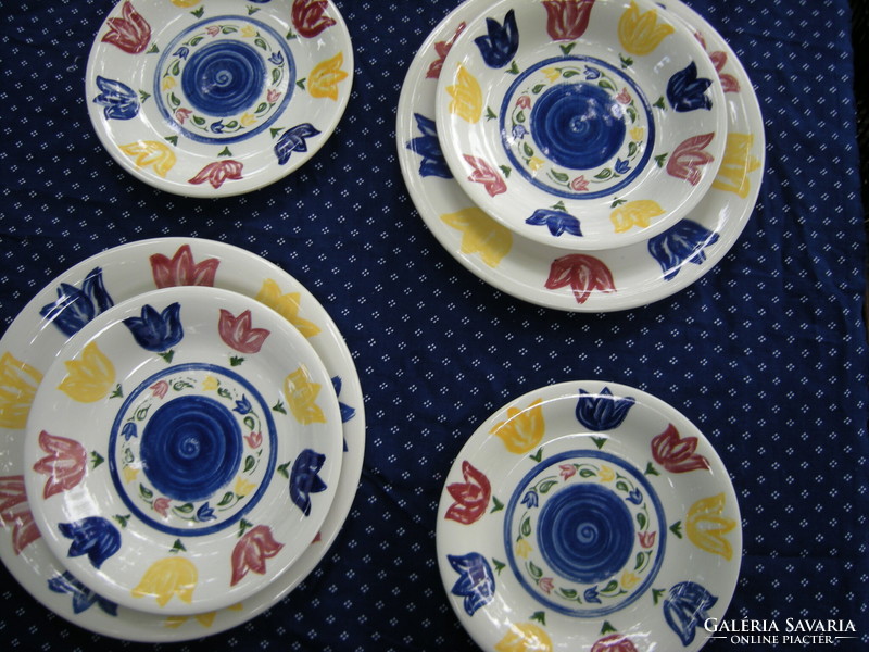 A set of English plates for two with a tulip pattern in a spring atmosphere