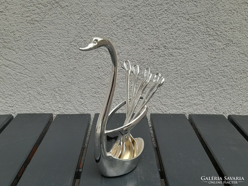 Beautiful swan holder with swan spoons