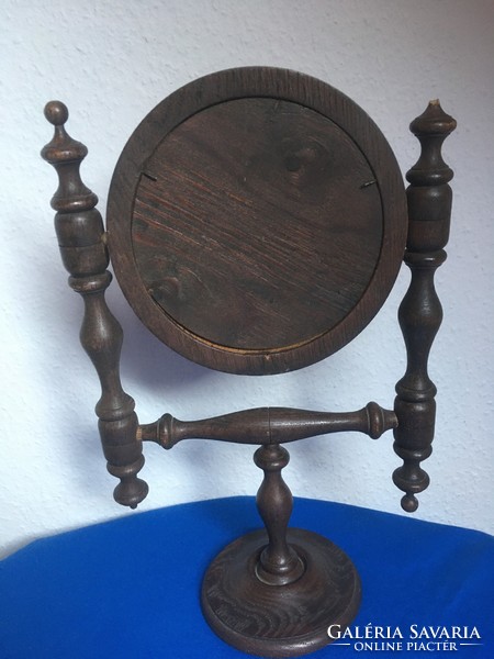 Old rotating wooden framed round mirror (missing) on a wooden base