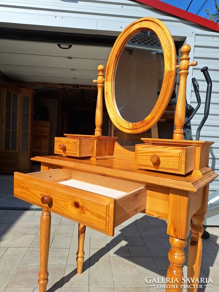 A pine dressing table with 3 drawers and a mirror for sale. Furniture is beautiful, in like-new condition.
