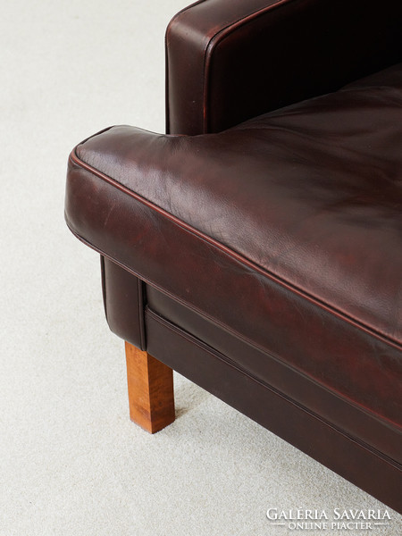 Danish midcentury armchair with leather and rosewood handles