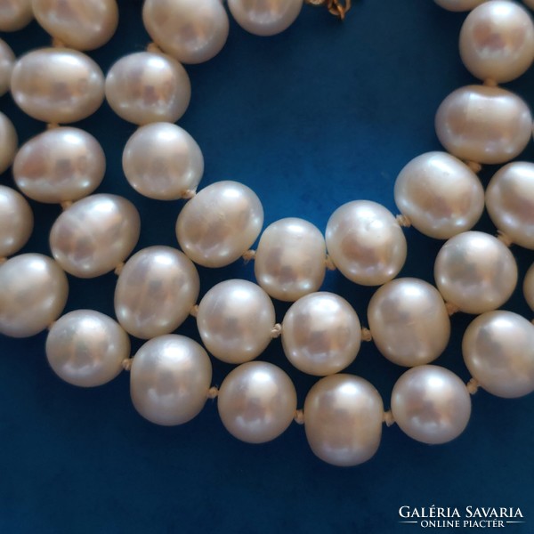 Real pearl necklace with 14k gold ball clasp, knotted string