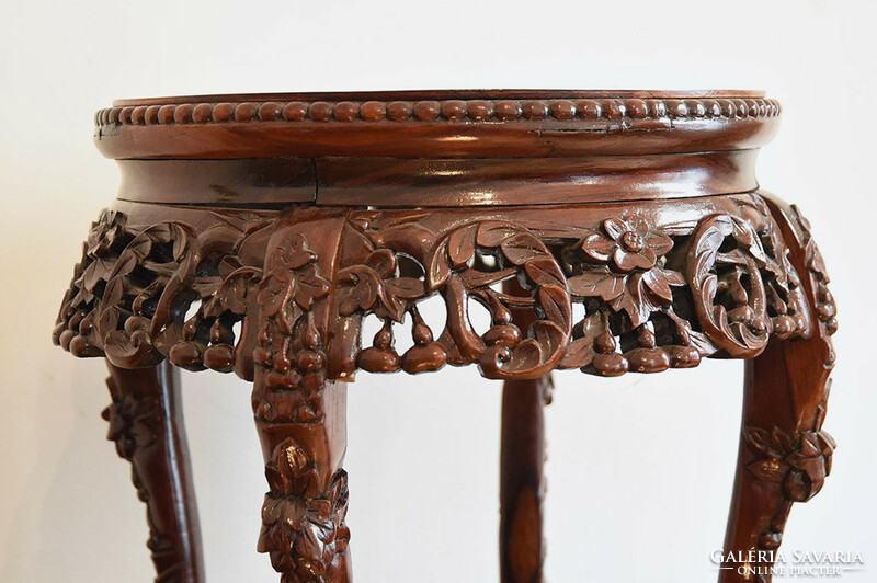 Chinese circular richly carved side table, glass top, 19th century. It's over
