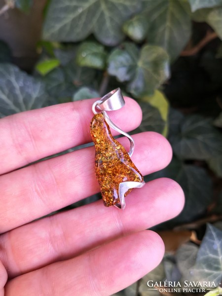 Beautiful silver pendant with real amber stones