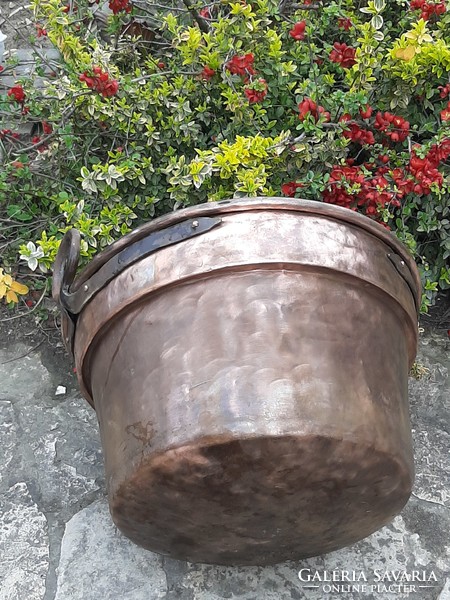 Huge antique red copper cauldron