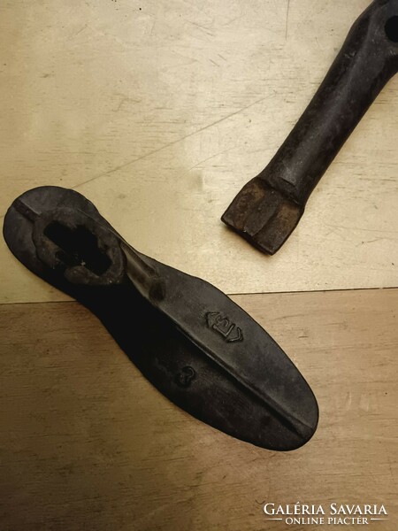 A shoemaker was given an iron anvil tool