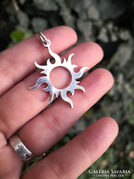 Men's silver sun pendant