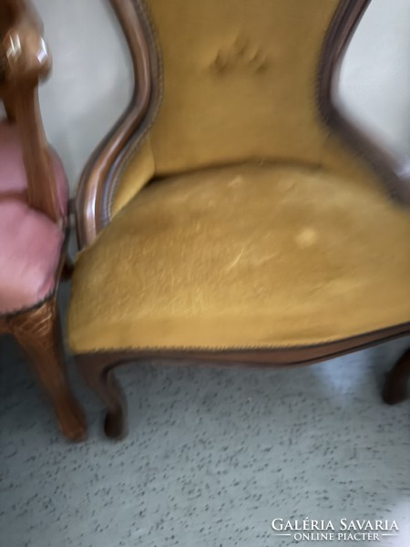 Small armchair with golden cover