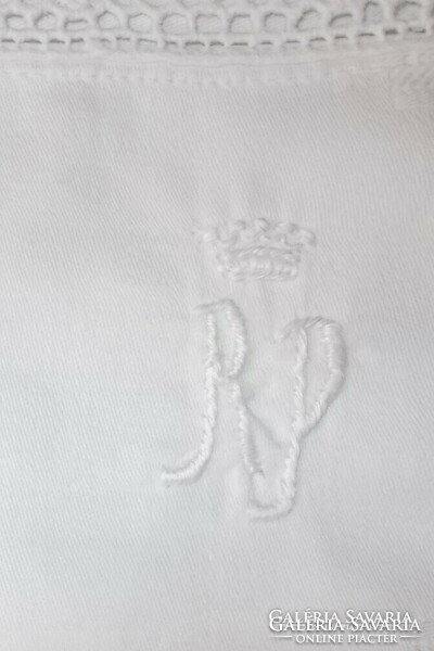 Crowned, monogrammed, azure damask pillowcase.