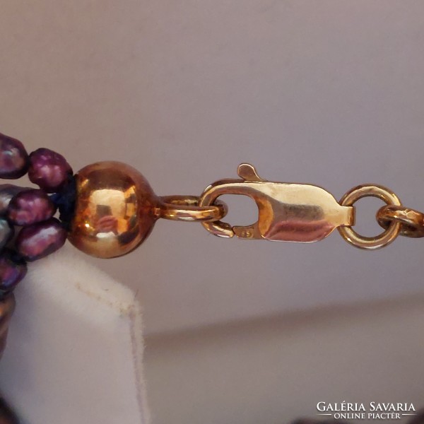 Colorful 4-row pearl bracelet with 14k gold setting