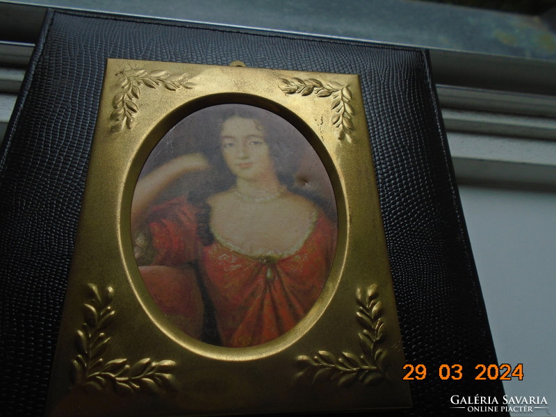 Gilded embossed copper frame with a portrait of an antique Venetian aristocratic lady