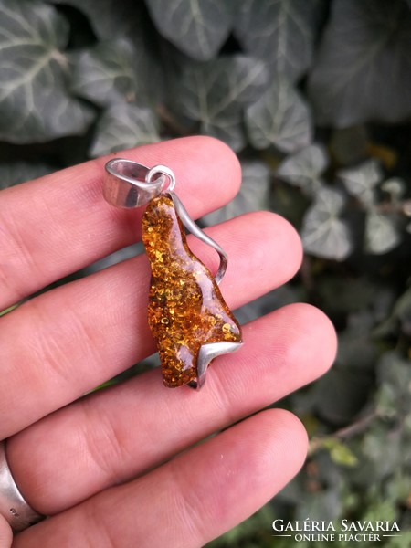 Beautiful silver pendant with real amber stones