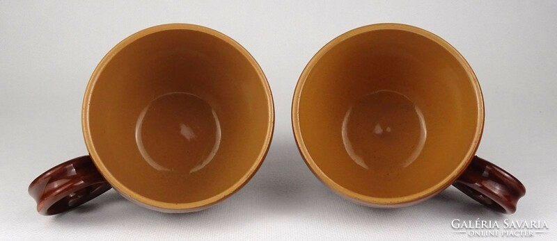 Pair of 1Q973 dripped glazed ceramic mugs