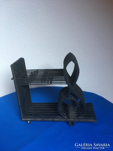 Plastic vinyl record holder with treble clef and note motif - damaged