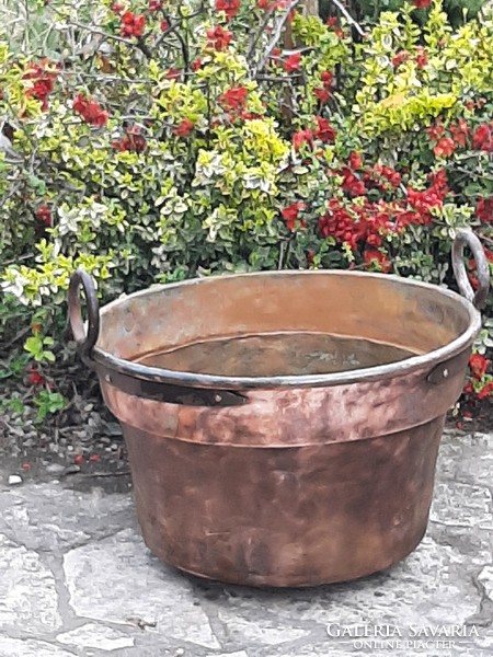 Huge antique red copper cauldron