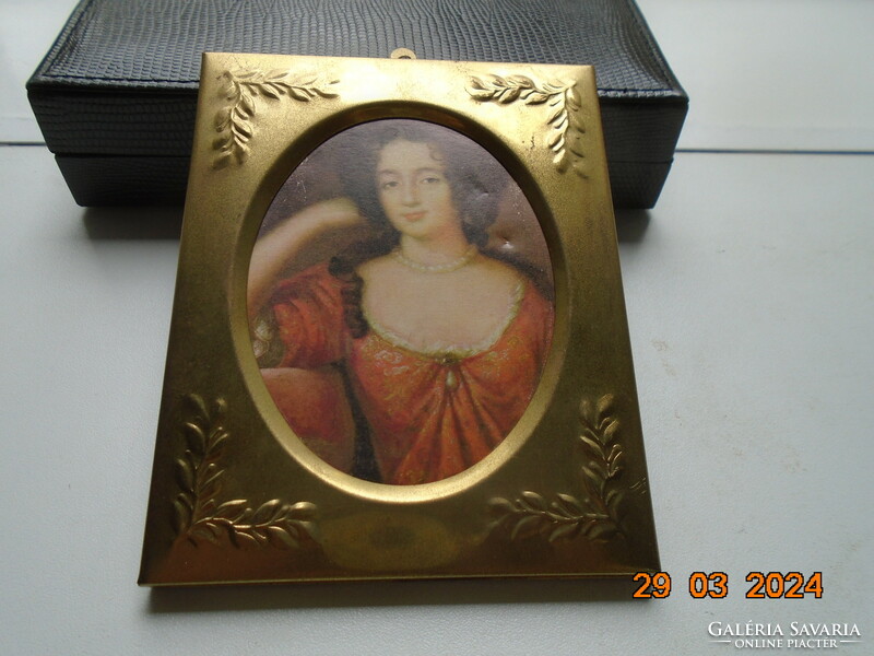 Gilded embossed copper frame with a portrait of an antique Venetian aristocratic lady