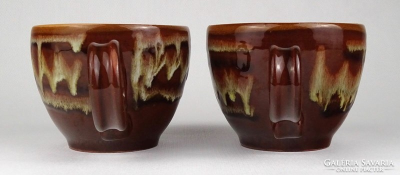 Pair of 1Q973 dripped glazed ceramic mugs