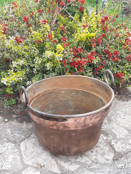 Huge antique red copper cauldron