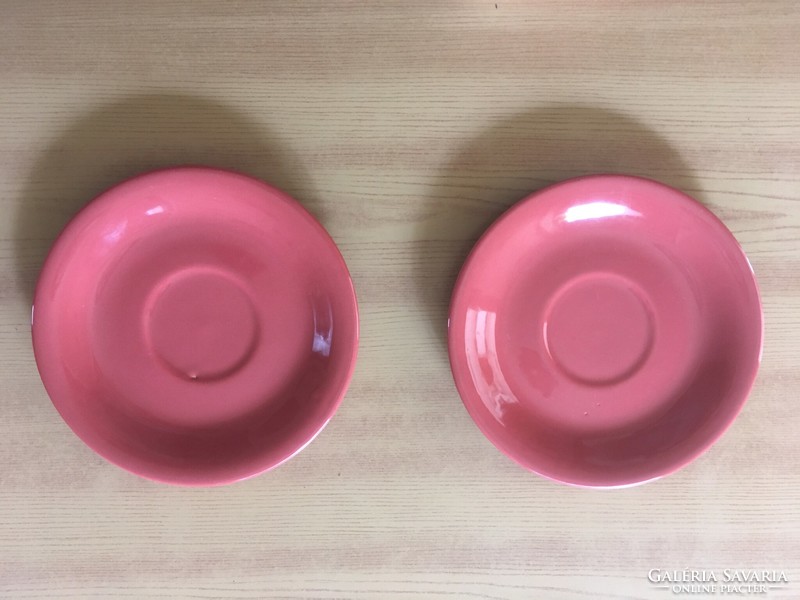 Two dark pink ceramic plates - saucers