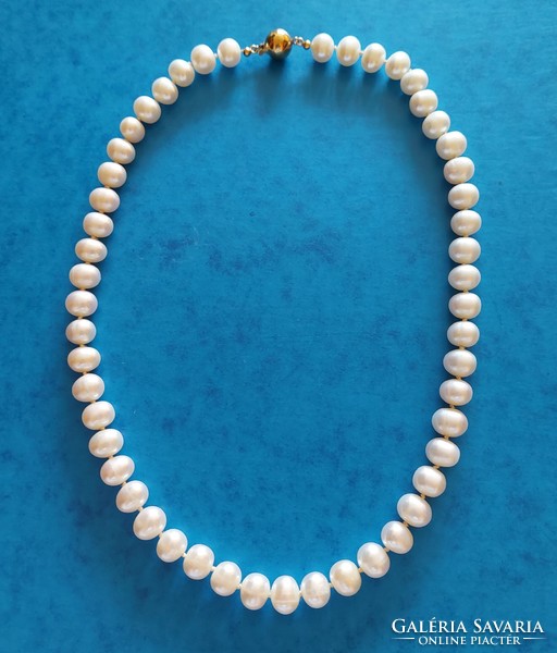 Real pearl necklace with 14k gold ball clasp, knotted string