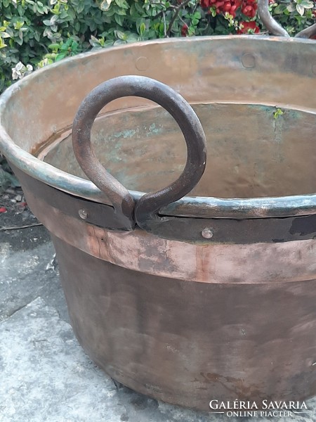 Huge antique red copper cauldron