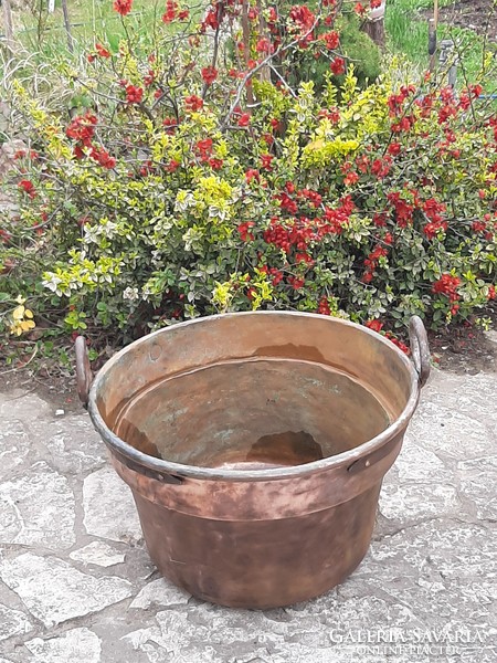 Huge antique red copper cauldron