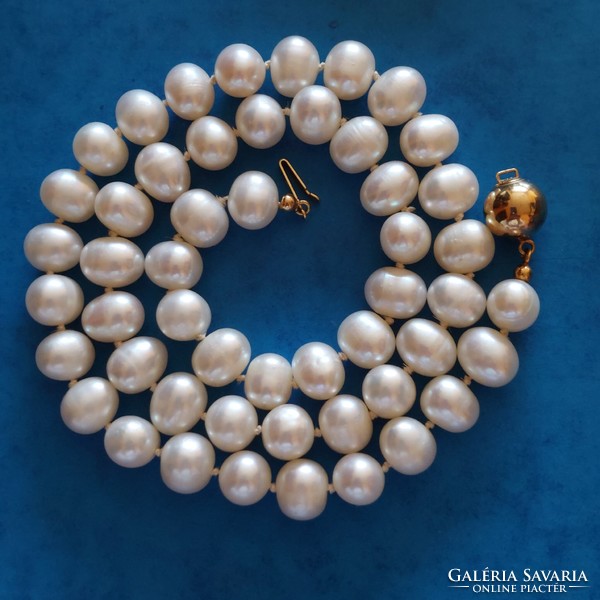 Real pearl necklace with 14k gold ball clasp, knotted string