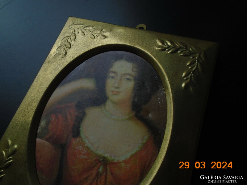 Gilded embossed copper frame with a portrait of an antique Venetian aristocratic lady