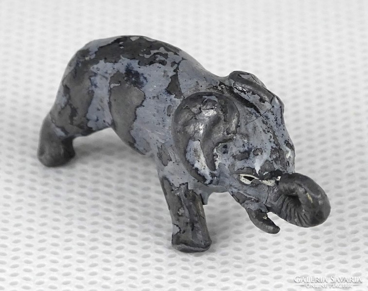 1Q100 antique mini tin elephant 1.7 X 3.9 Cm