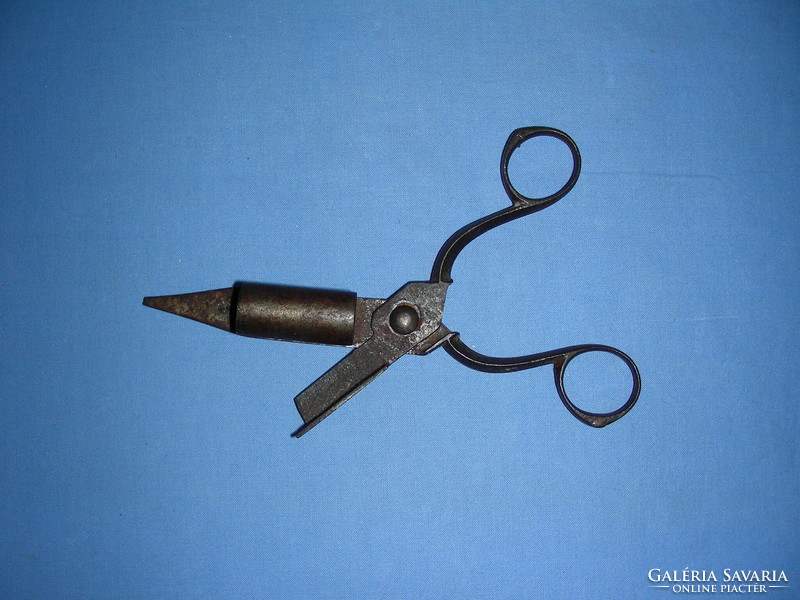 Antique wrought iron candle knocker