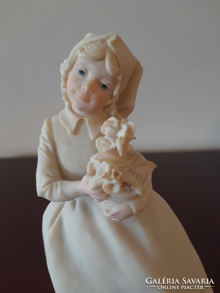 Little girl with flowers capodimonte figurine