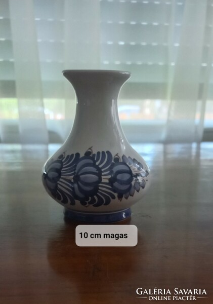Small ceramic vase with blue flowers