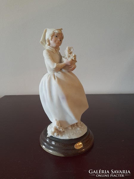 Little girl with flowers capodimonte figurine