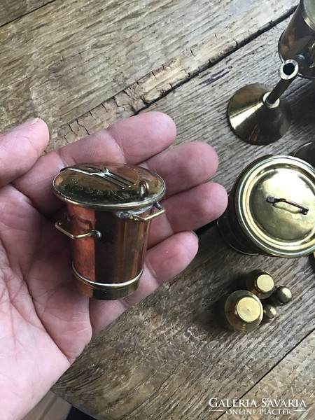 Old miniature yellow and red copper vessels in one