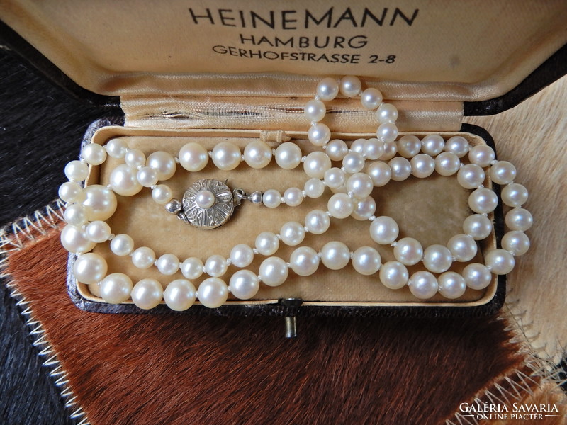 Is it real freshwater? String of pearls with 8 carat art deco style gold clasp