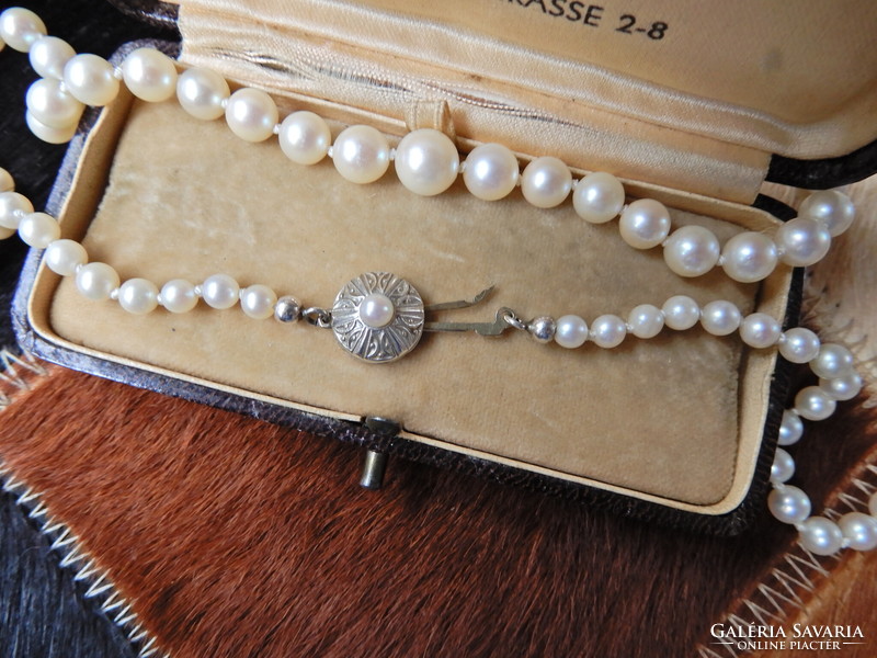 Is it real freshwater? String of pearls with 8 carat art deco style gold clasp