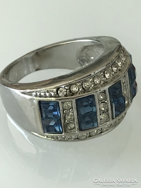 Stainless steel ring with square-cut sapphire-colored crystals and many small colorless crystals