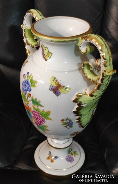 Decorative vase from Herend, painted with a victorian pattern, with acanthus leaf ears. 42 Cm..