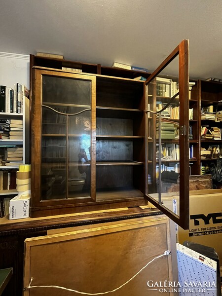 Antique wooden cabinet with glass