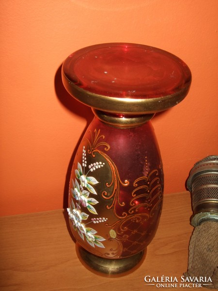 Ruby red vase, richly gilded, decorated with plastic flowers