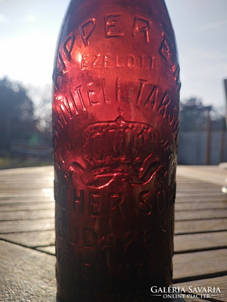 A rarer beer bottle with rips.